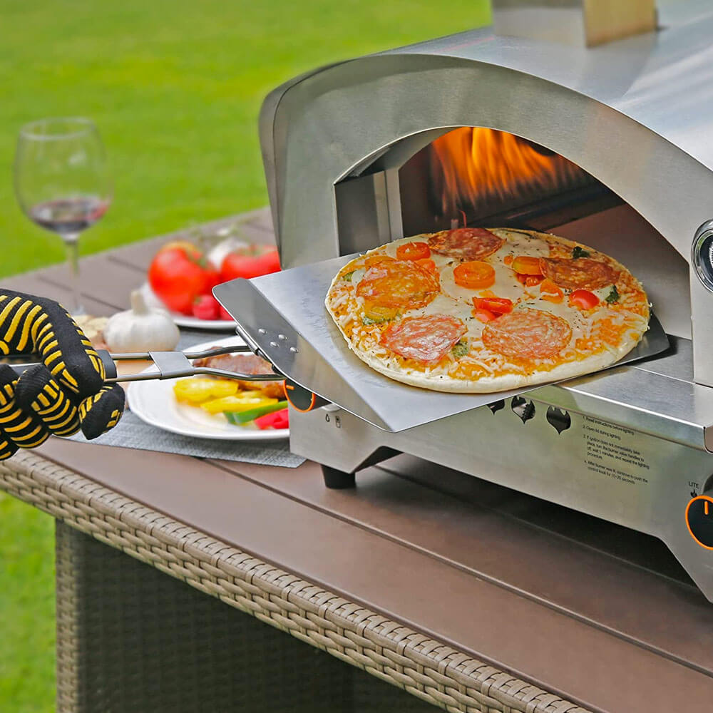 Turner de pizza Braai de acero inoxidable