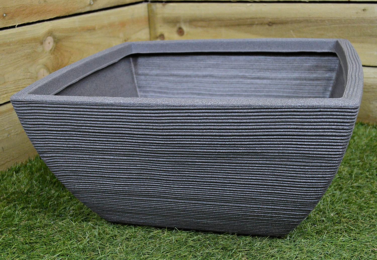 52cm Lightweight ribbed flower pot from Netherlands is weather-resistant because of it's UV resistant plastic material and it is lightweight for easy portability between your home, garden, living area, patio and wherever you want your pot plant to be. No drainage holes so no leakage will occur. Size: 52 x 52 x 25cm. Bags Direct wholesale online shop Y54192720