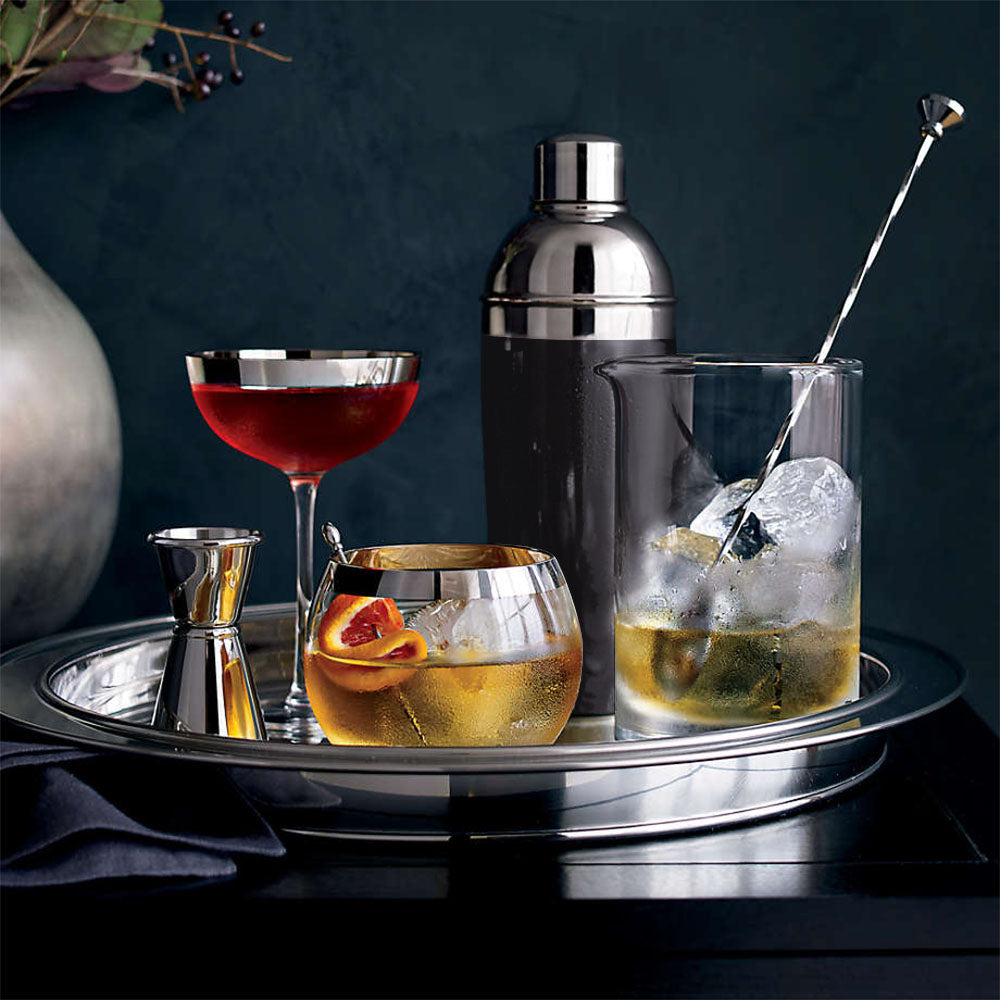 Stainless Steel Bar Set of 4 with 500ml Cocktail Shaker, 1 Ice Bucket, 1 champagne cooler and 1 Tong is a all in 1 cocktail set for bars, home bars, events and parties. The ice buckets will keep your wine, brandy, vodka and other beverages cold. Dishwasher safe, but hand washing is recommended. Size packed: 23 x 23 x 23cm. Bags Direct wholesale online shop A12405600