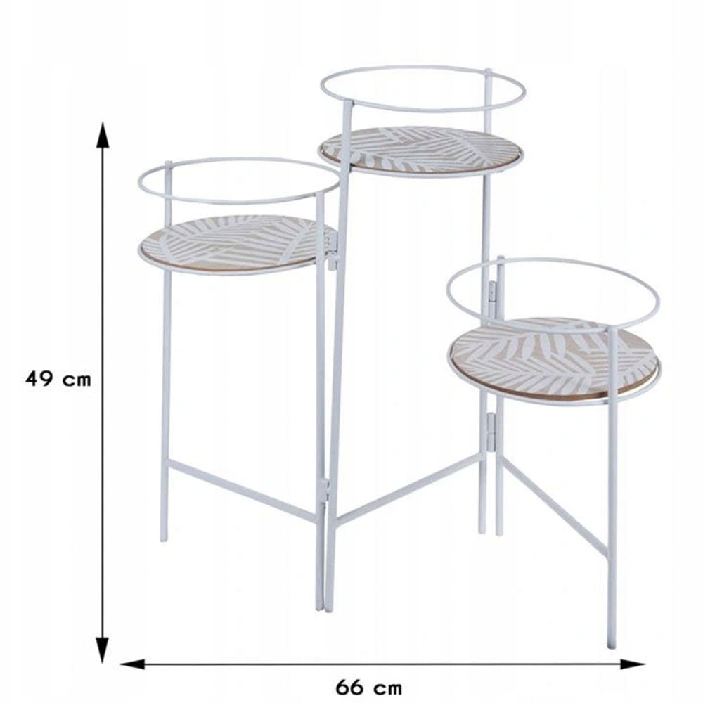 Metal foldable 3 plants flowerpot holder stand with adjustable width 55-64cm. The foldout structure allows you to change the arrangement of individual pot plants. The coasters have a leaf motif print on the base. It can complement a variety of interiors, use it on the balcony, garden, or porch. Size: 66 x 22 x 49cm. Eco lifestyle online shop HZ1915050